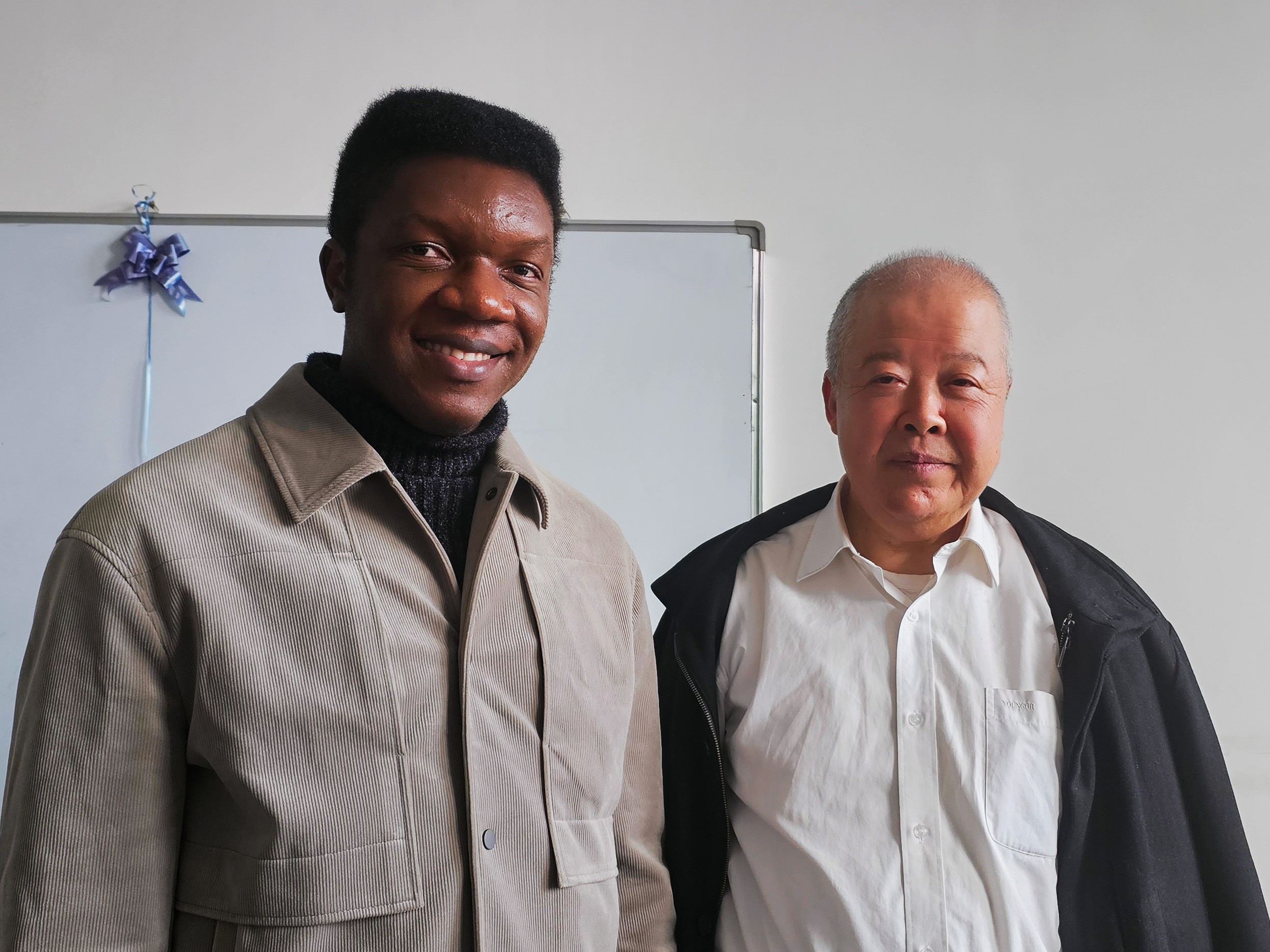 Moses Olabhele Esangbedo with Professor Liu Sifeng, grey systems theory scholar