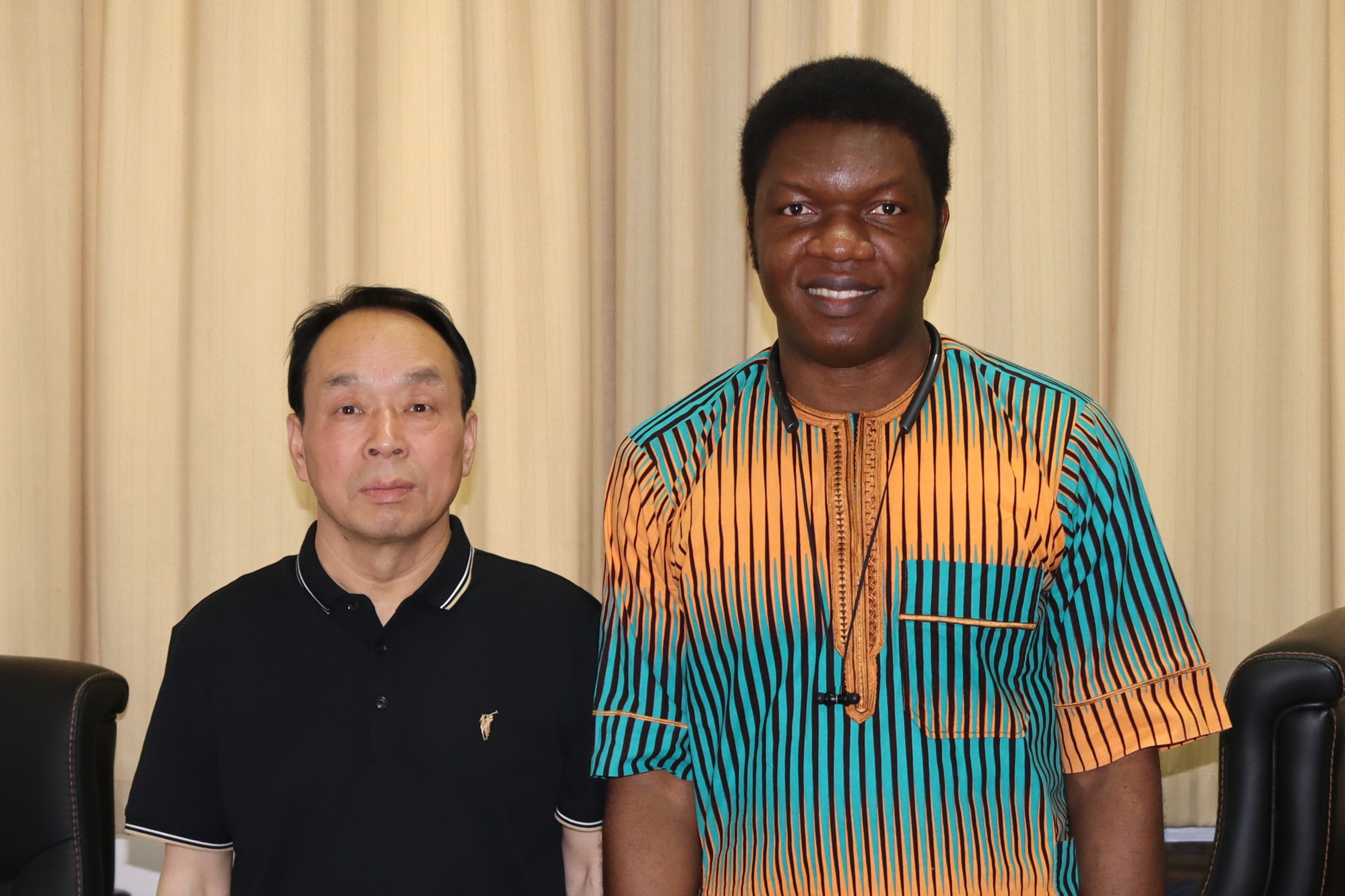 Moses Olabhele Esangbedo with Professor Xue Jianwu, second postdoctoral supervisor and information management professor